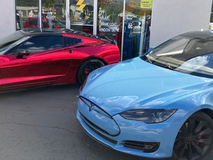 Wrapped cars at the Temecula Auto Wraps Old Town storefront