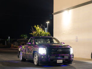 Purple graphic-wrapped truck at night by Temecula Auto Wraps